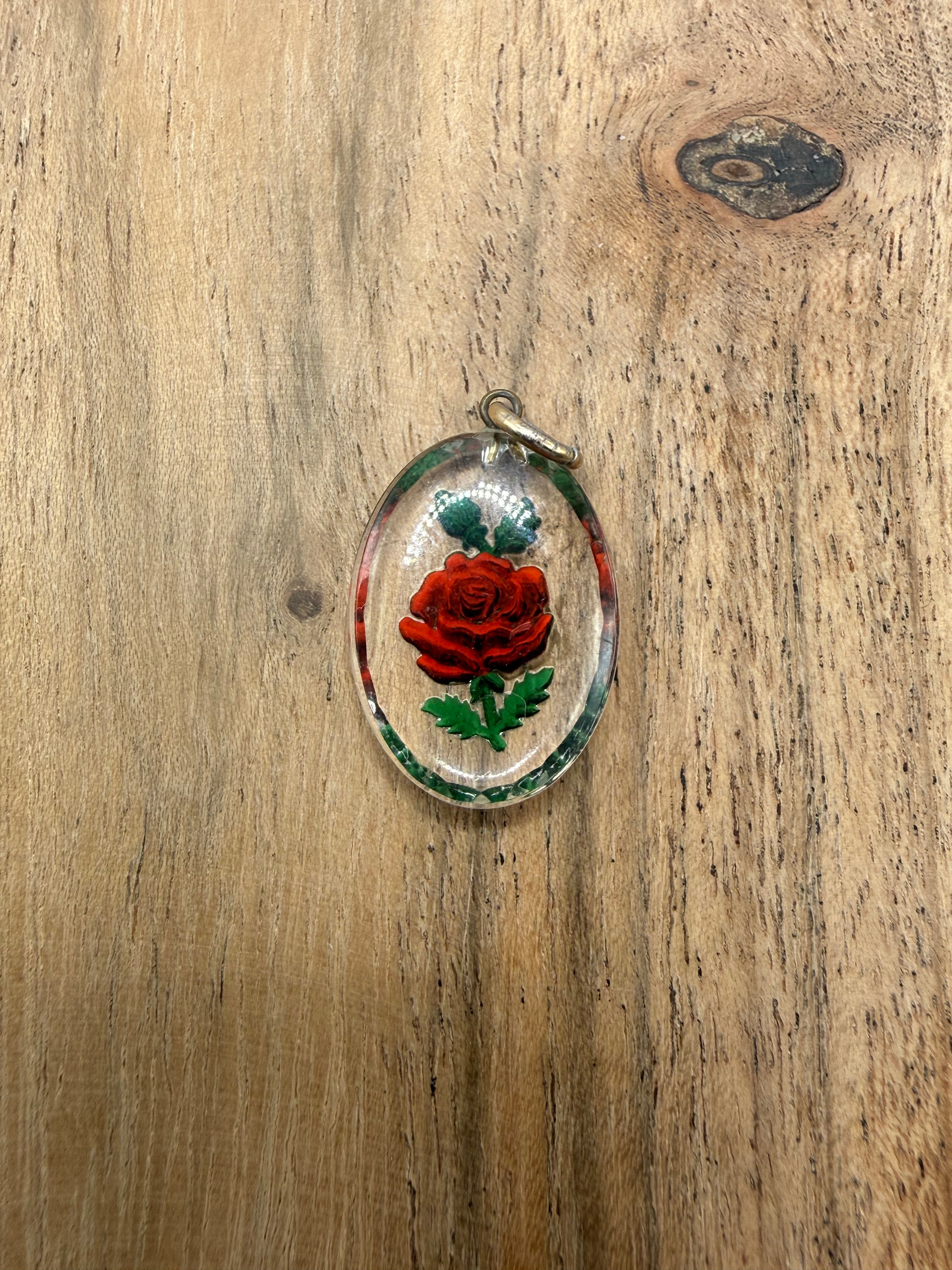 Reverse Carved Rose Pendant
