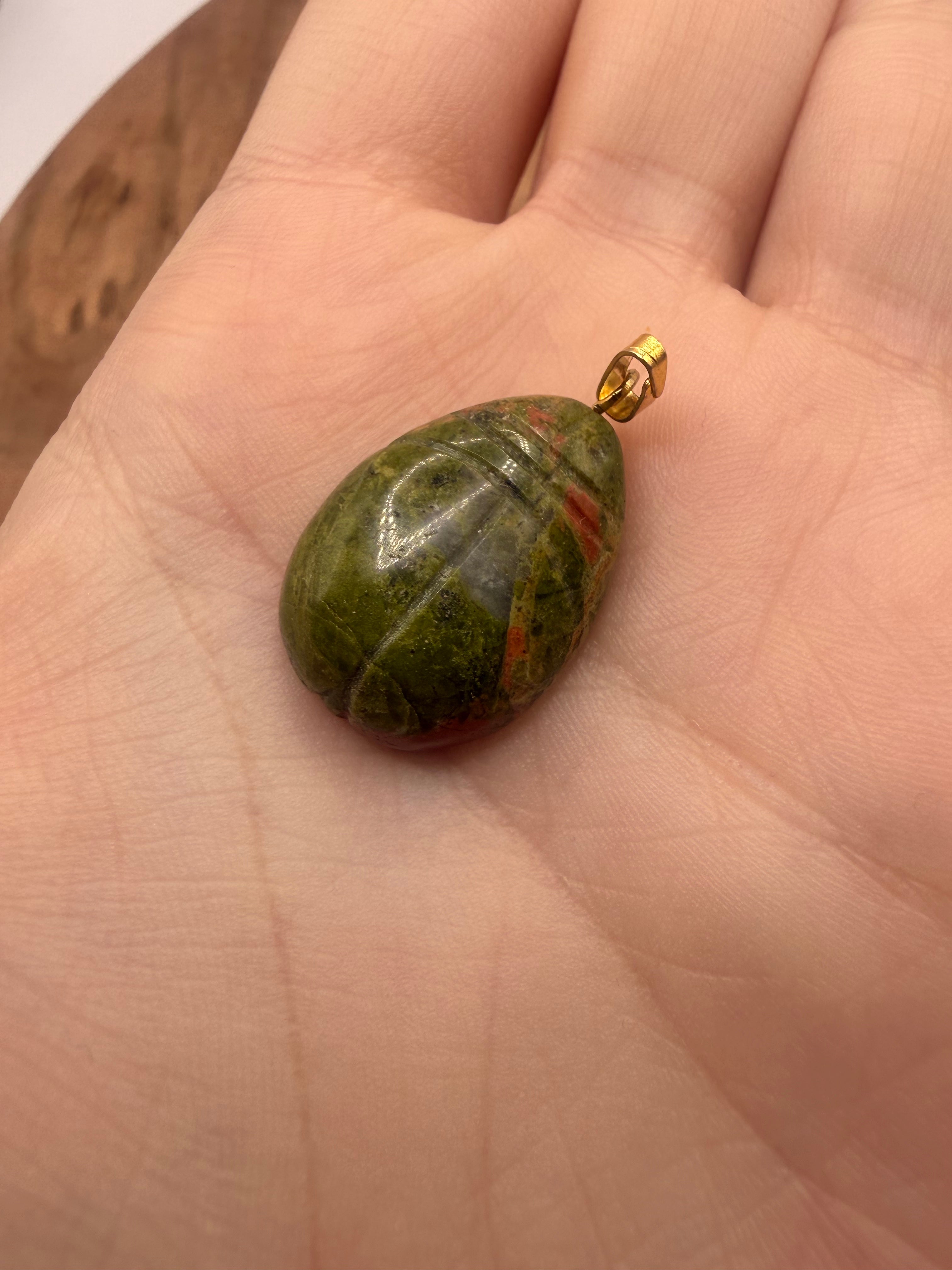 Carved Unakite pendant