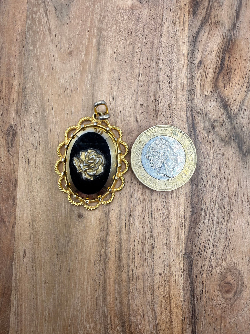 Gold Tone Black Glass Oval Cameo Pendant